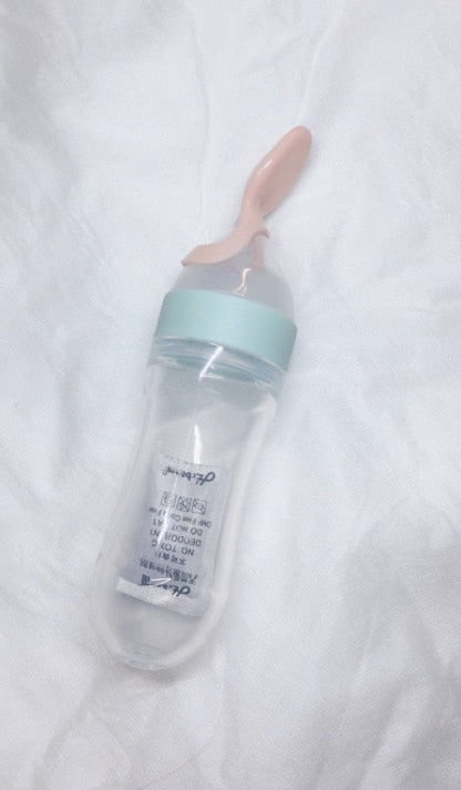 Botella de alimentación exprimidora para bebé